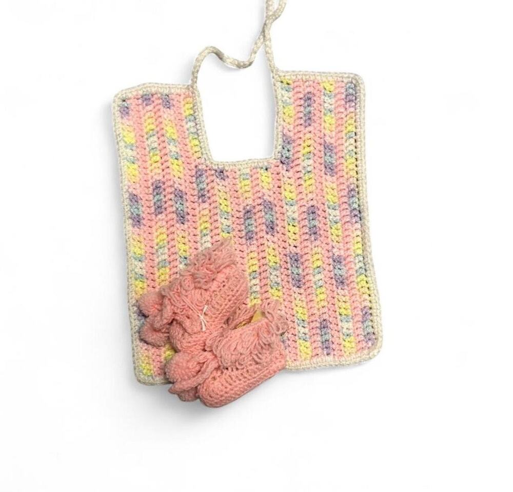 Handmade crocheted baby bib and newborn booties set in excellent condition